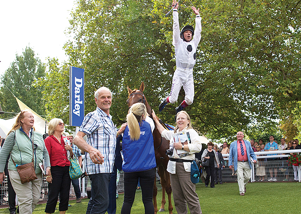  - Frankie Dettori flying dismount after winning the Group 1 Prix Jean Romanet - 24 August 2014